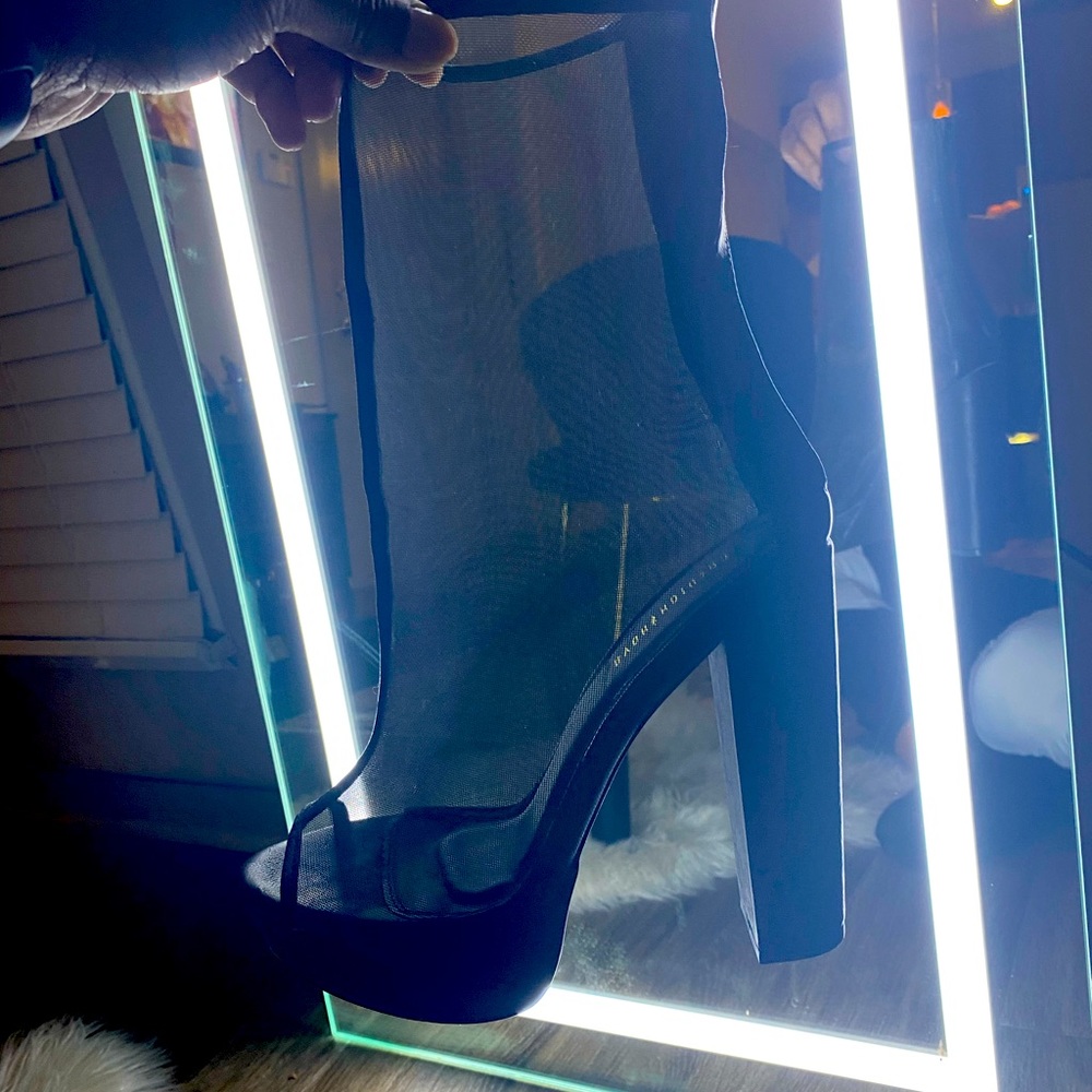 Edgy black sheer heels